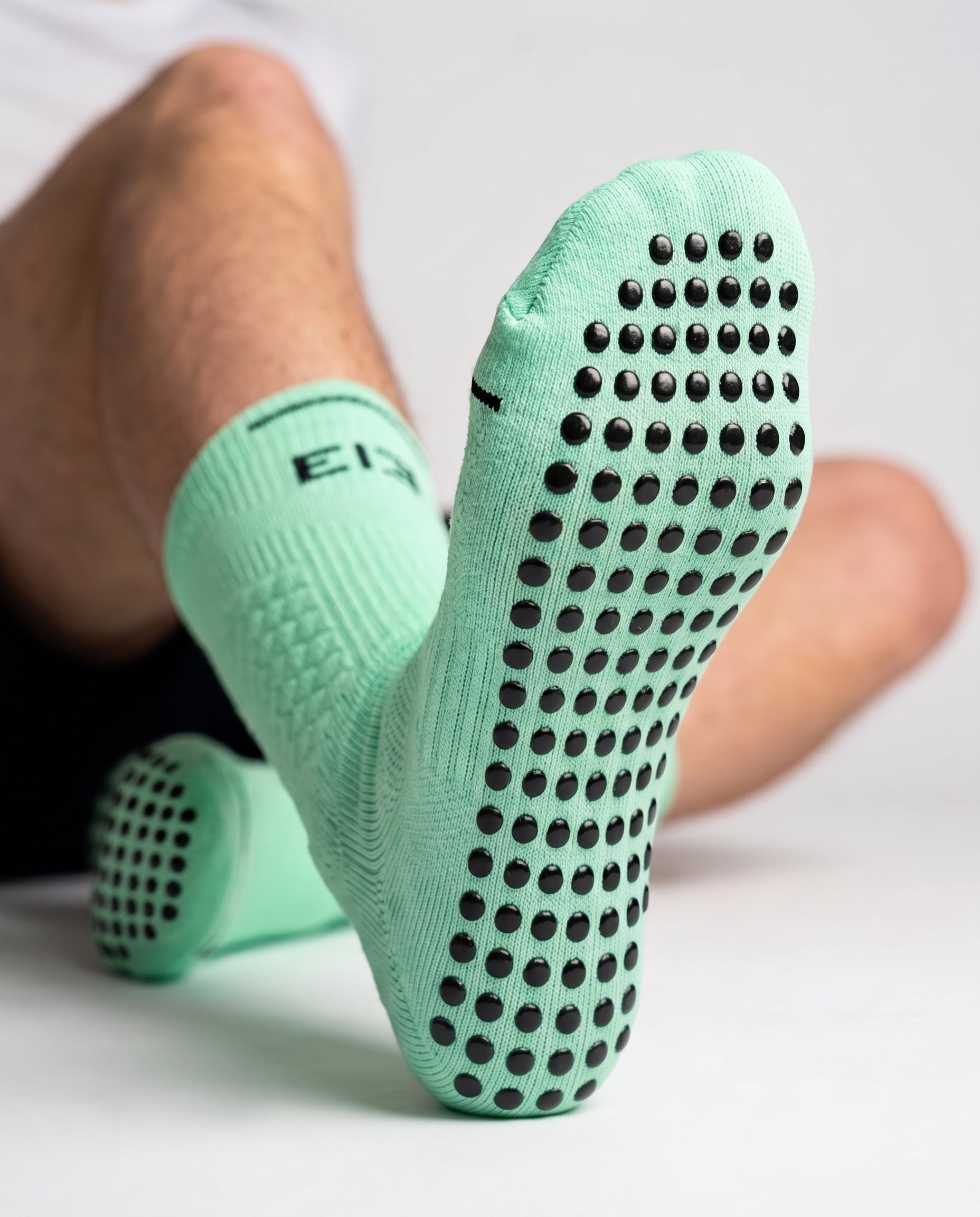 Detalle del grip antideslizante del calcetín Element Classic color menta